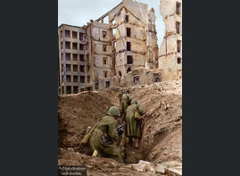 Soviet troops advancing through a trench during or after the battle of Stalingrad, late 1942.