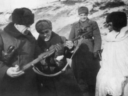 The commander of the 62nd Army Vasily Chuikov and a military council member Kuzma Gurov scrutinizing a rifle of a legendary sniper Vasily Zaytsev The commander of the 62nd Army Vasily Chuikov and a military council member Kuzma Gurov scrutinizing a rifle of a legendary sniper Vasily Zaytsev
