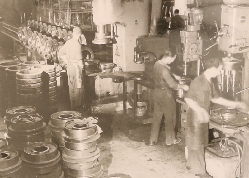 Factory workers at the site for the production of undercarriage components