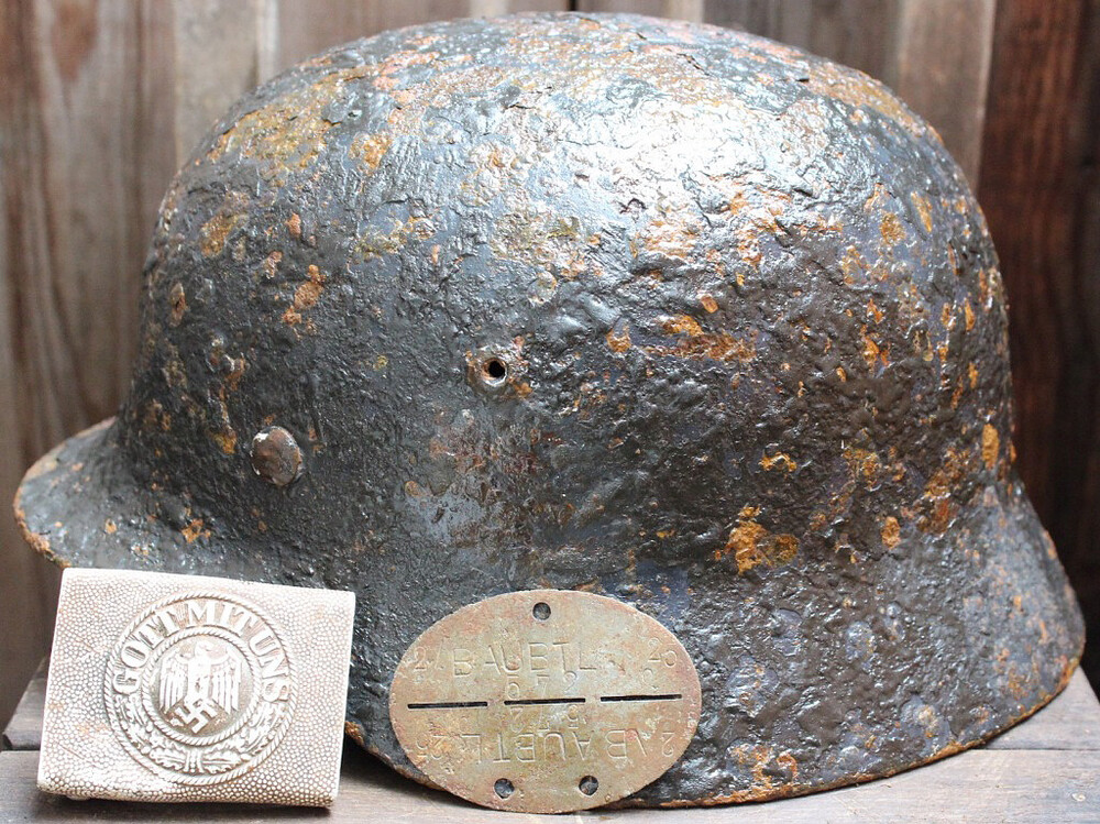German helmet M35 with buckle and dogtag / from Novgorod
