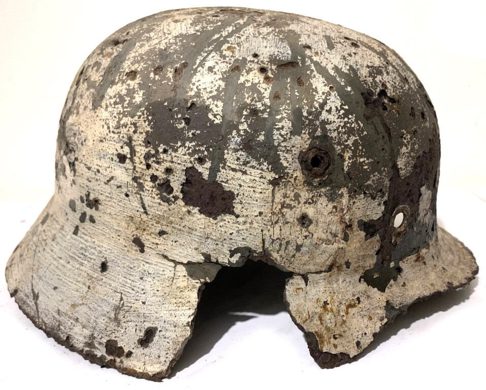 Winter camo German helmet M35 / from Veliky Novgorod