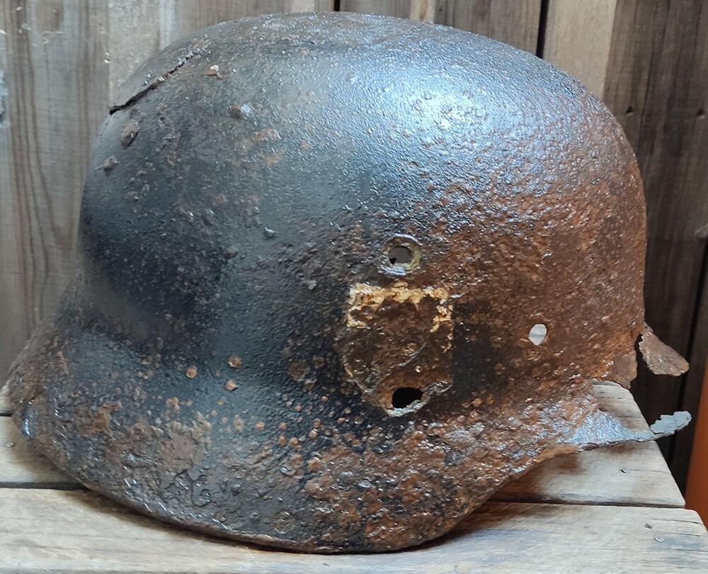 Waffen SS helmet M40 / from Karelia