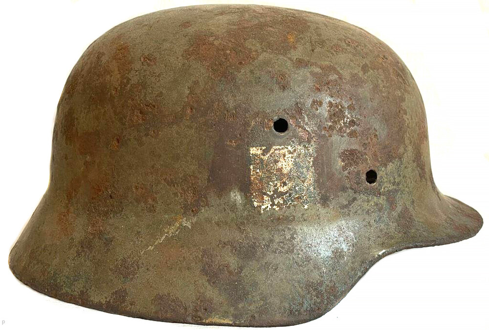 Waffen SS helmet M35 / from Demyansk pocket