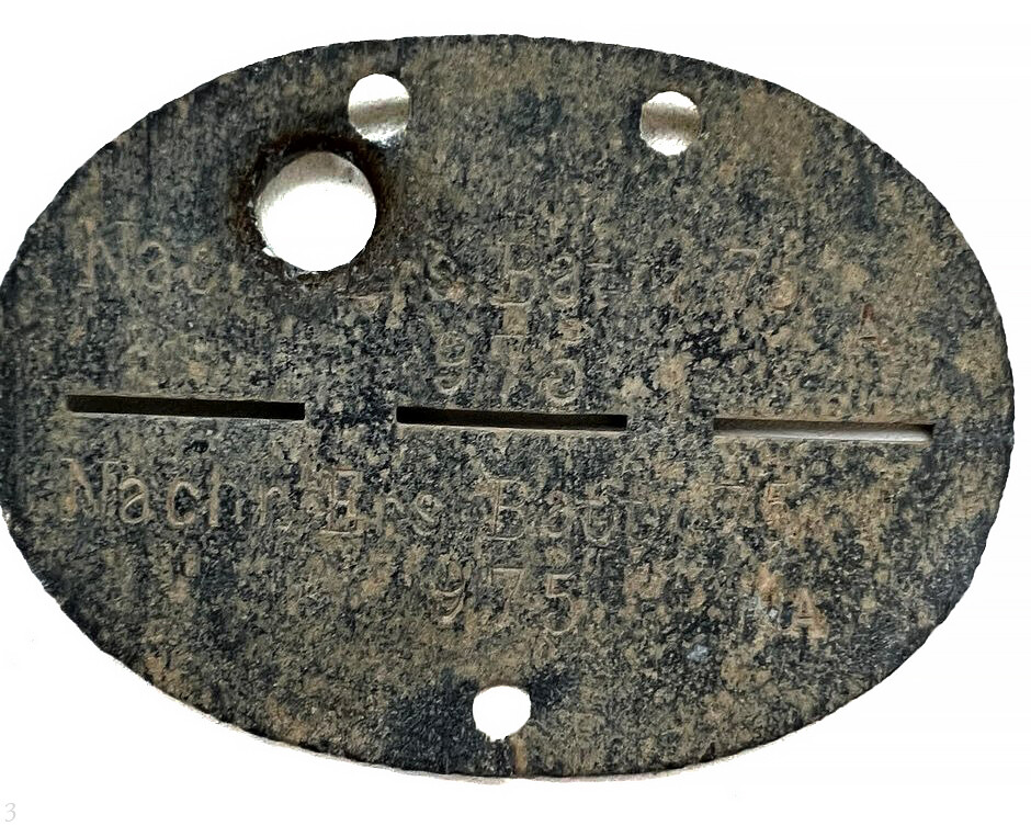 German dogtag with a bullet hit / from Vitebsk