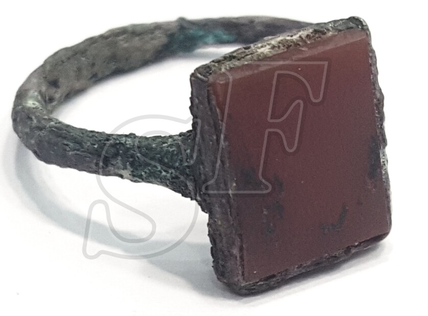 Ring with red stone