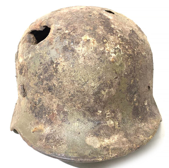 Restored German battle helmet