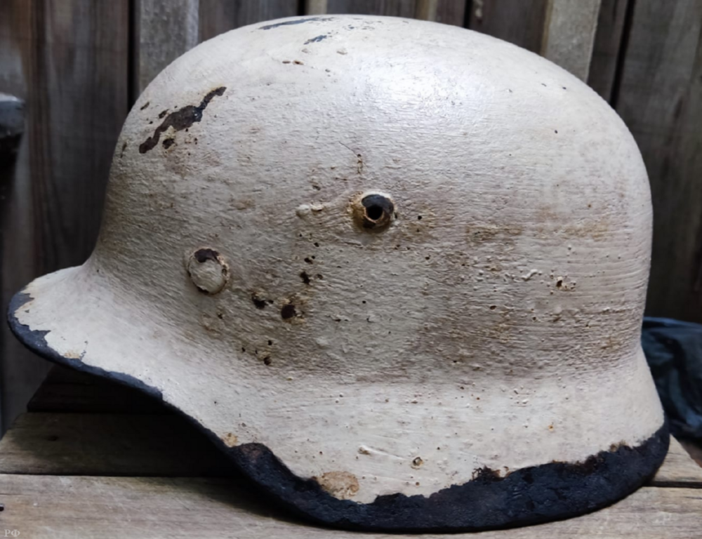 Winter camo German helmet M35 / from Novgorod