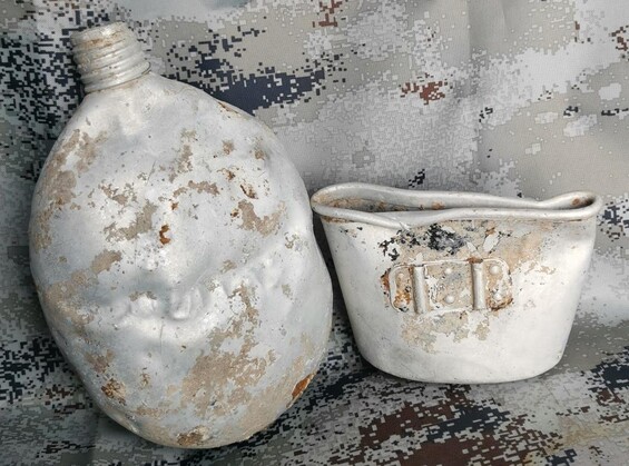 Soviet flask and German mug / from Stalingrad