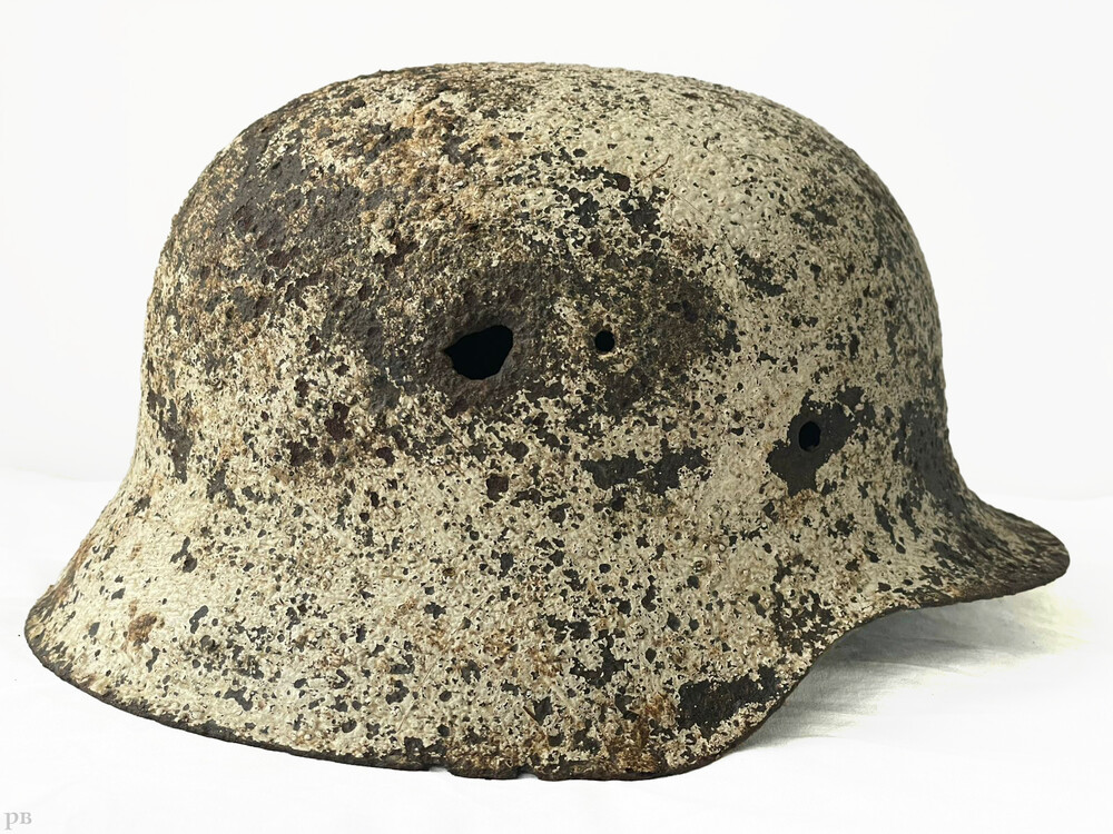 Winter camo German helmet M35 / from Vitebsk
