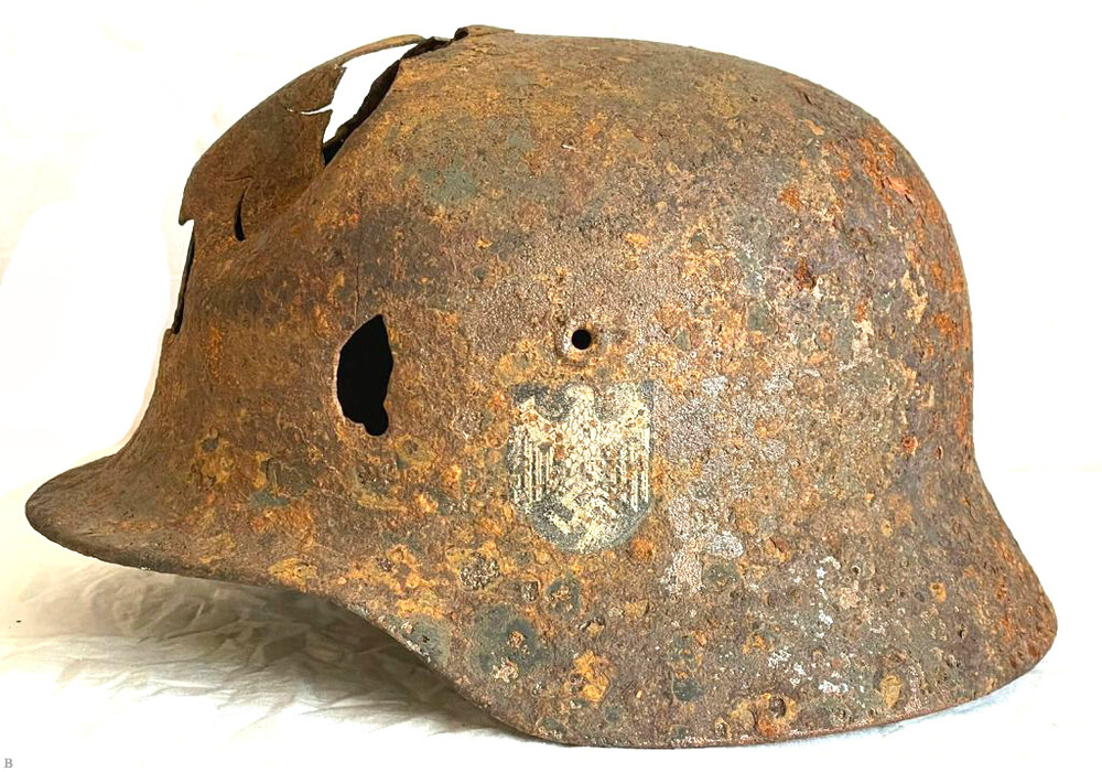 Wehrmacht helmet M40 / from Demyansk