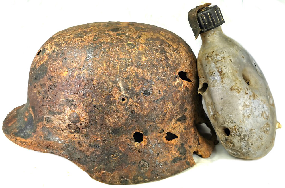 German helmet M40 and flask / from Stalingrad